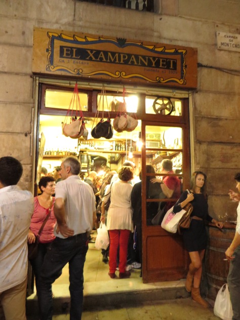 People spilling out the front of El Xampanyet--Oh how I miss this bustling warm ambiance--Its not crowded to the point where you will not get any service or would have to wait an hour for food. 