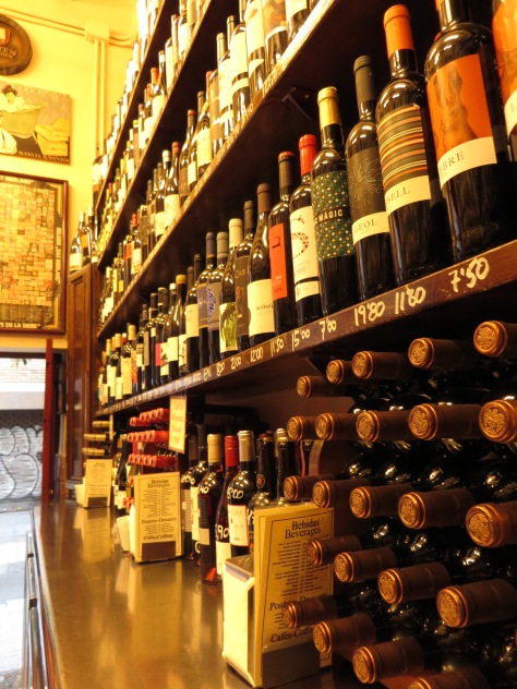 The walls are lined with stacked bottles of vino...cute and intimate vibe.