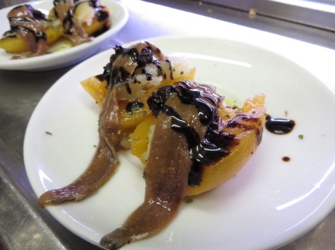 Creative take on the savory, fresh, sweet combo: Rich salty anchovies, laid over a fresh halved peach (reminded me of the concept of prosciutto e melone)