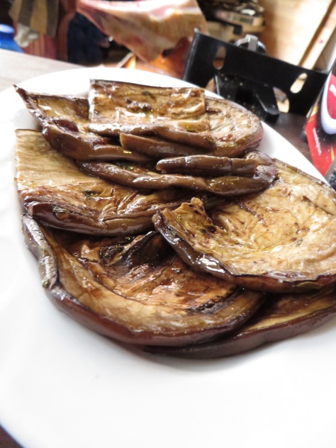Roasted eggplant slices with garlic and olive oil--simple and rustic